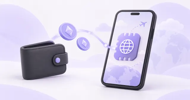 Krypto-Wallet und Münzen neben einem Smartphone mit Reise-eSIM.